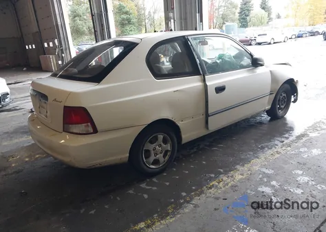 2002 Hyundai Accent L из США, поврежденный, VIN KMHCF35G82U159746